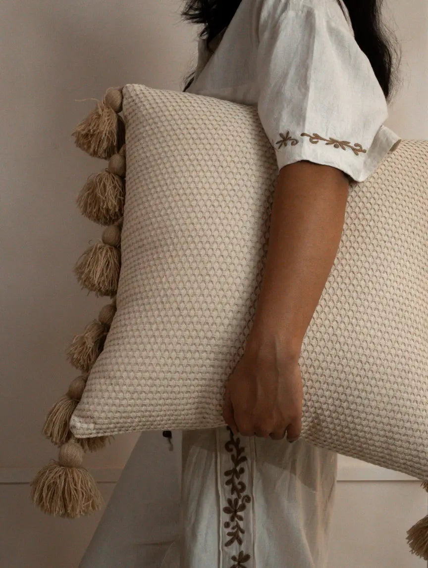 Waffle cushion cover with tassels, cotton linen boho pillow held indoors