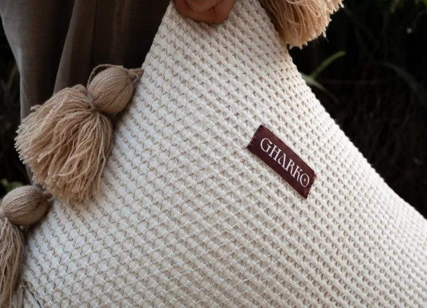 Textured waffle cushion cover with Gharko label, cotton linen fabric detail