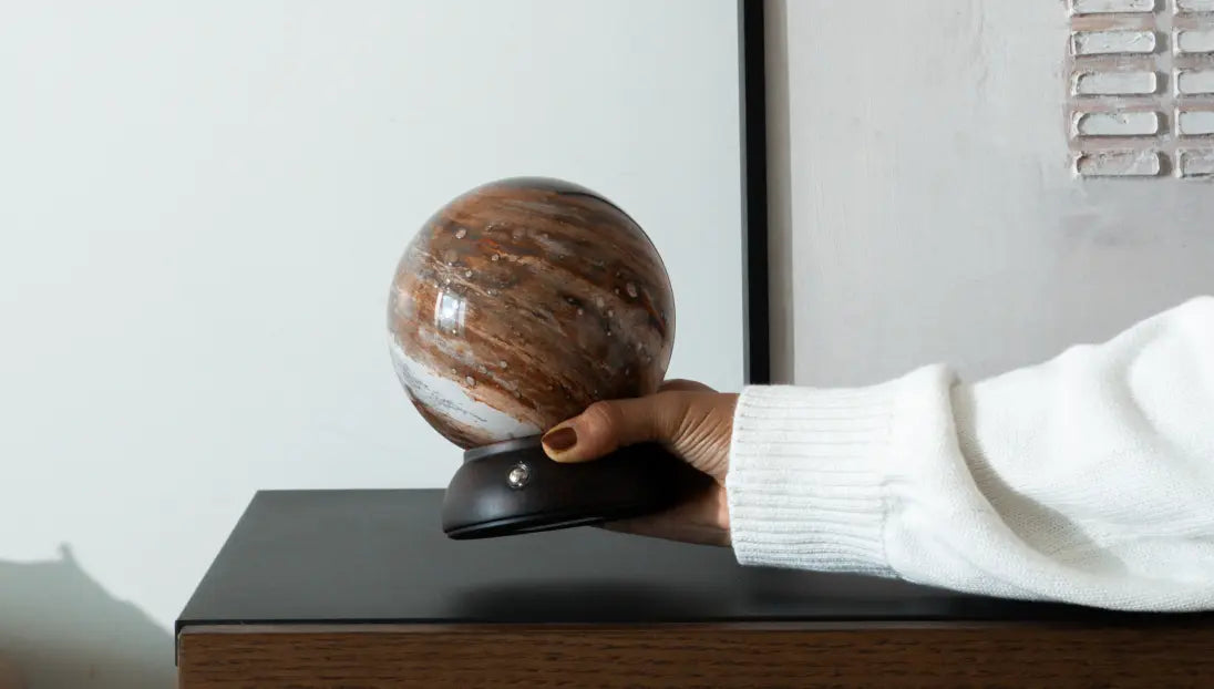 Cosmo glass portable table lamp styled on a modern bedside table