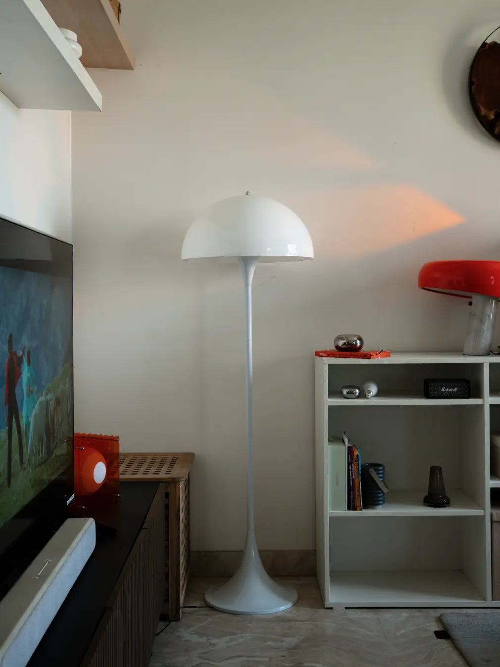 Nova white floor lamp in daylight, showing its dome shade and flared base
