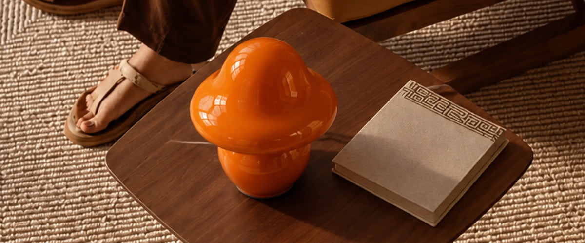 Mini Mushroom Orange Glass Table Lamp styled on a wooden side table