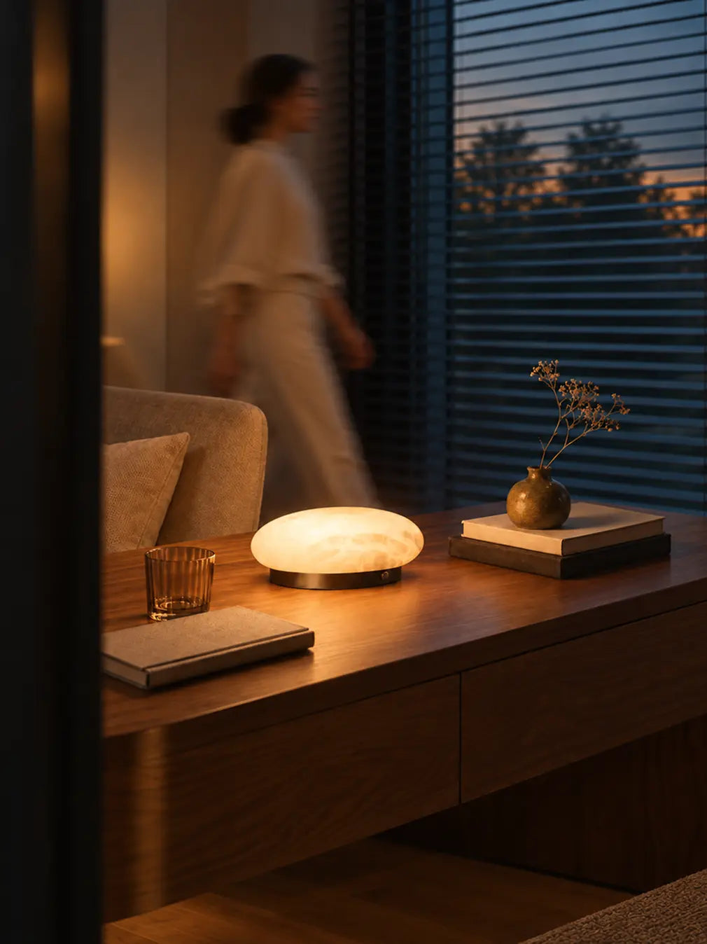 Pebble Marble Portable Table Lamp on a wooden table beside books and a vase