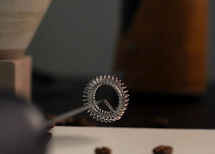 Close-up of the Twist Milk Frother’s stainless steel whisk, emphasizing its precision and durability.